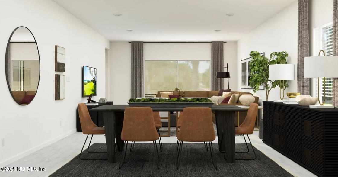 460 Hasler Avenue St. Augustine, FL 32092 - Photo 24 of 37 a view of a dining room with furniture and a potted plant