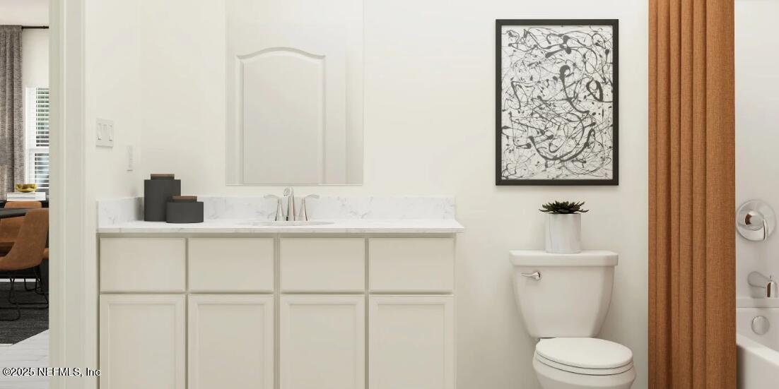 460 Hasler Avenue St. Augustine, FL 32092 - Photo 33 of 37 a bathroom with a toilet a sink and mirror