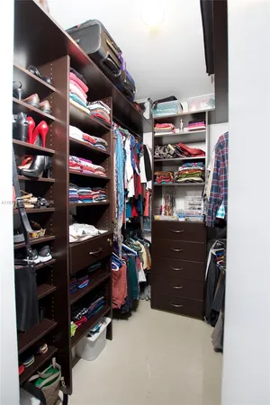 a room with lots of different colored cloths