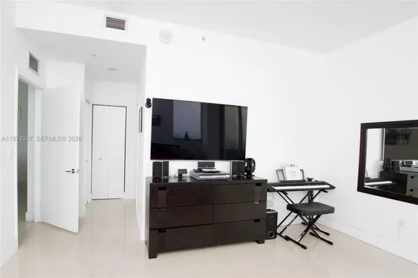 a view of a workspace with furniture