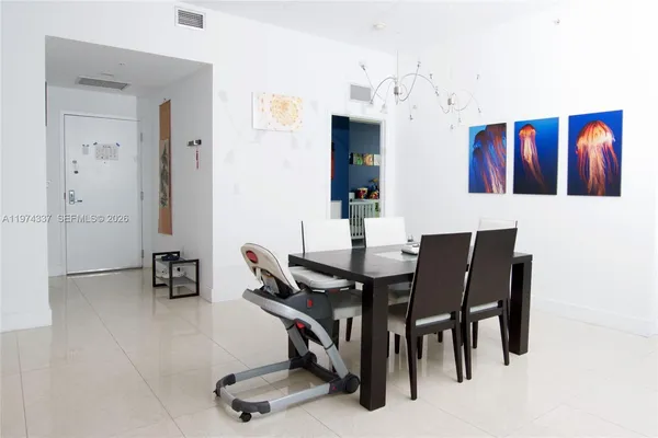 a view of a dining room with furniture