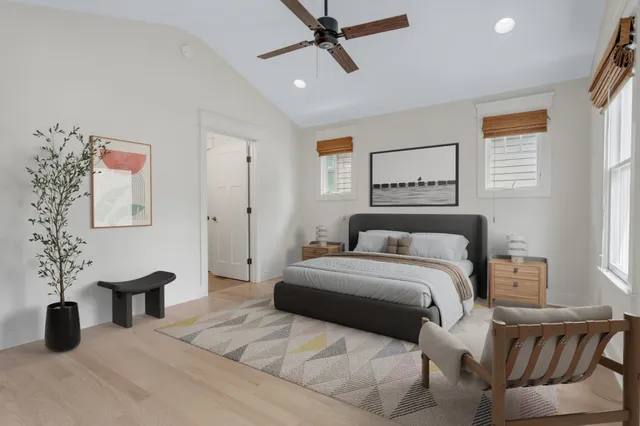 a bedroom with a bed and lamp