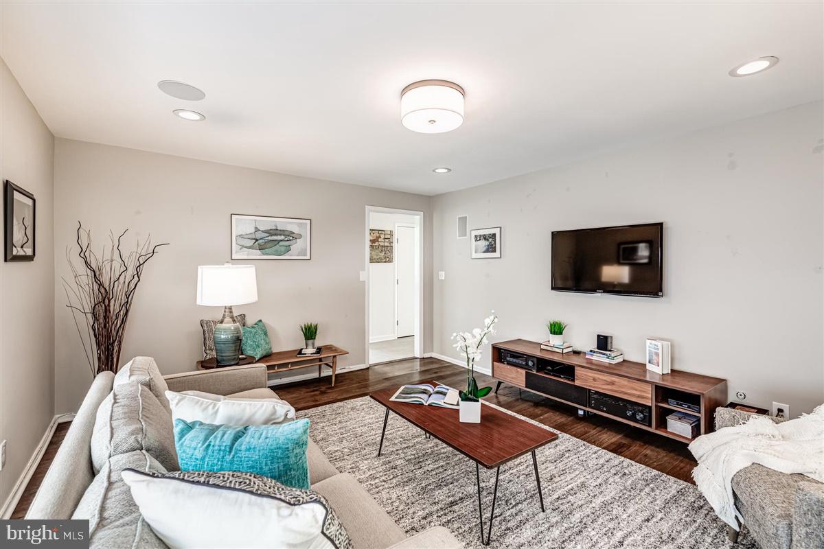649 Rosedale Road Princeton, NJ 08540 - Photo 14 of 36 a living room with furniture and a flat screen tv