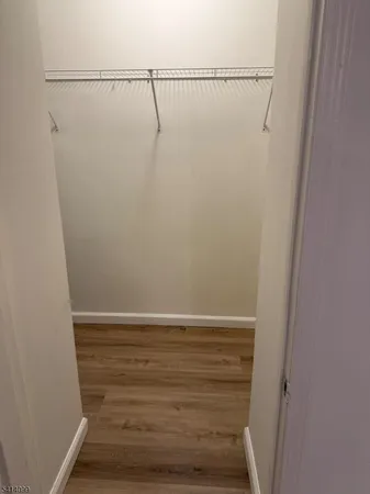 a view of small space with racks on the wall