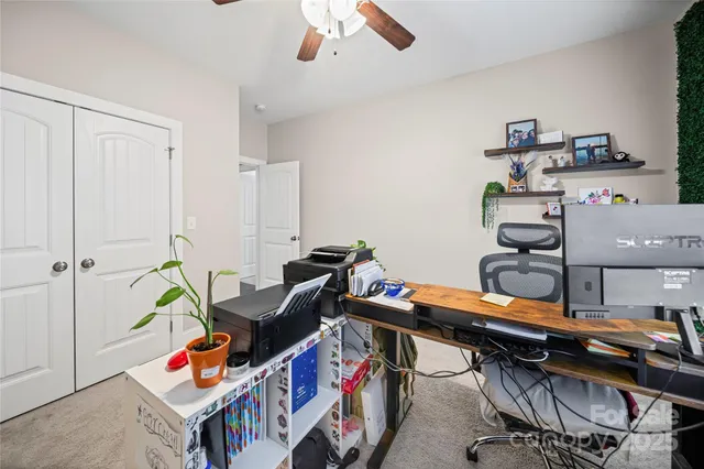 a room with furniture and musical instruments