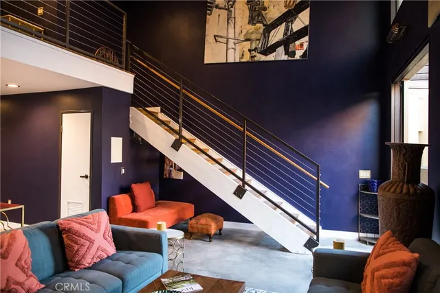 a outdoor living space with furniture and a fireplace