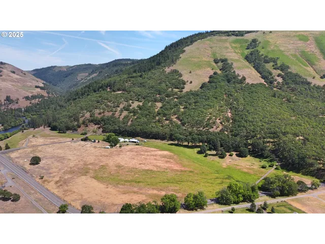 a view of a swimming pool with a yard