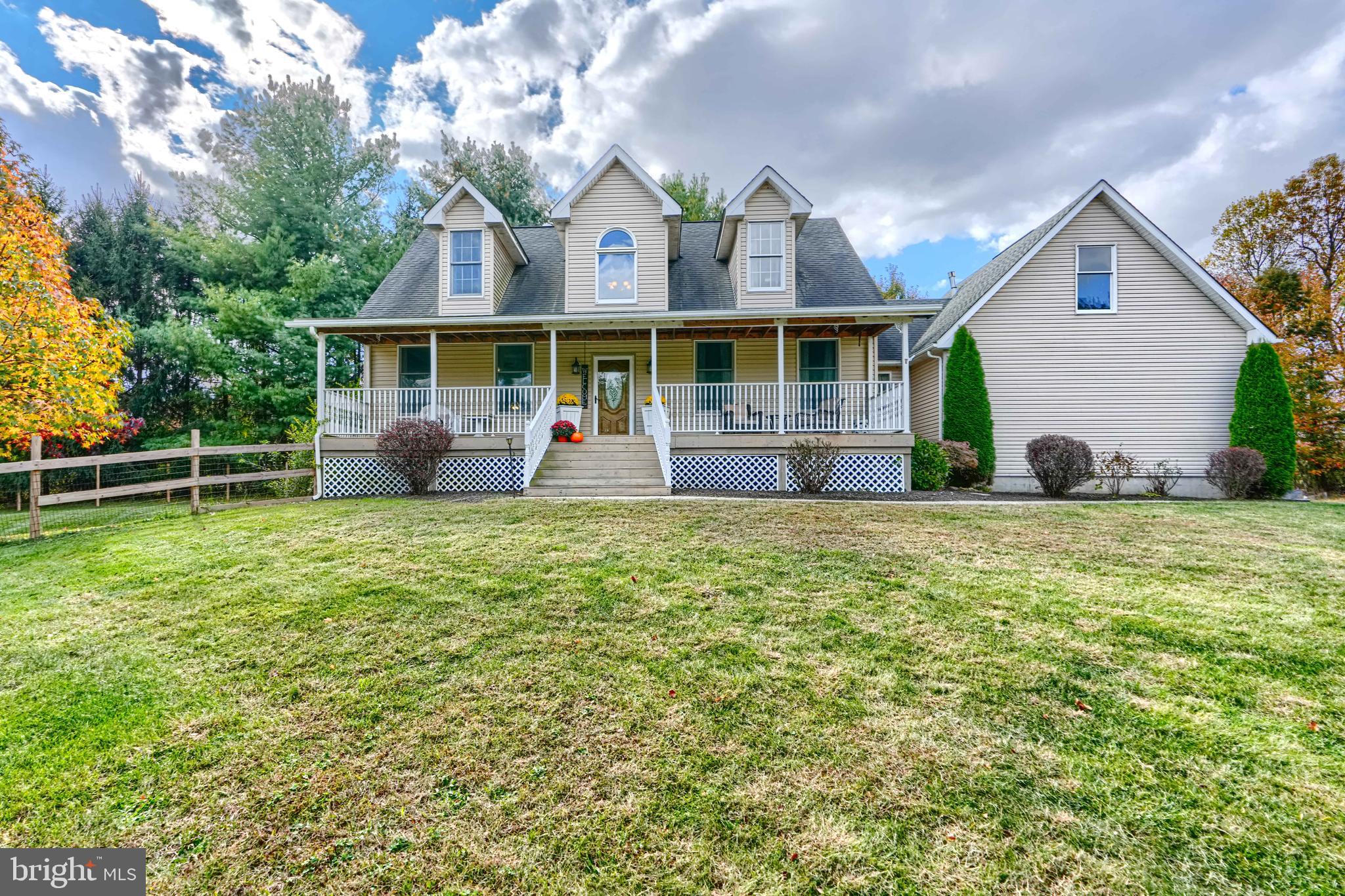 544 Elk Mills Road Elkton, MD 21921 - Photo 2 of 65 a front view of a house with a garden