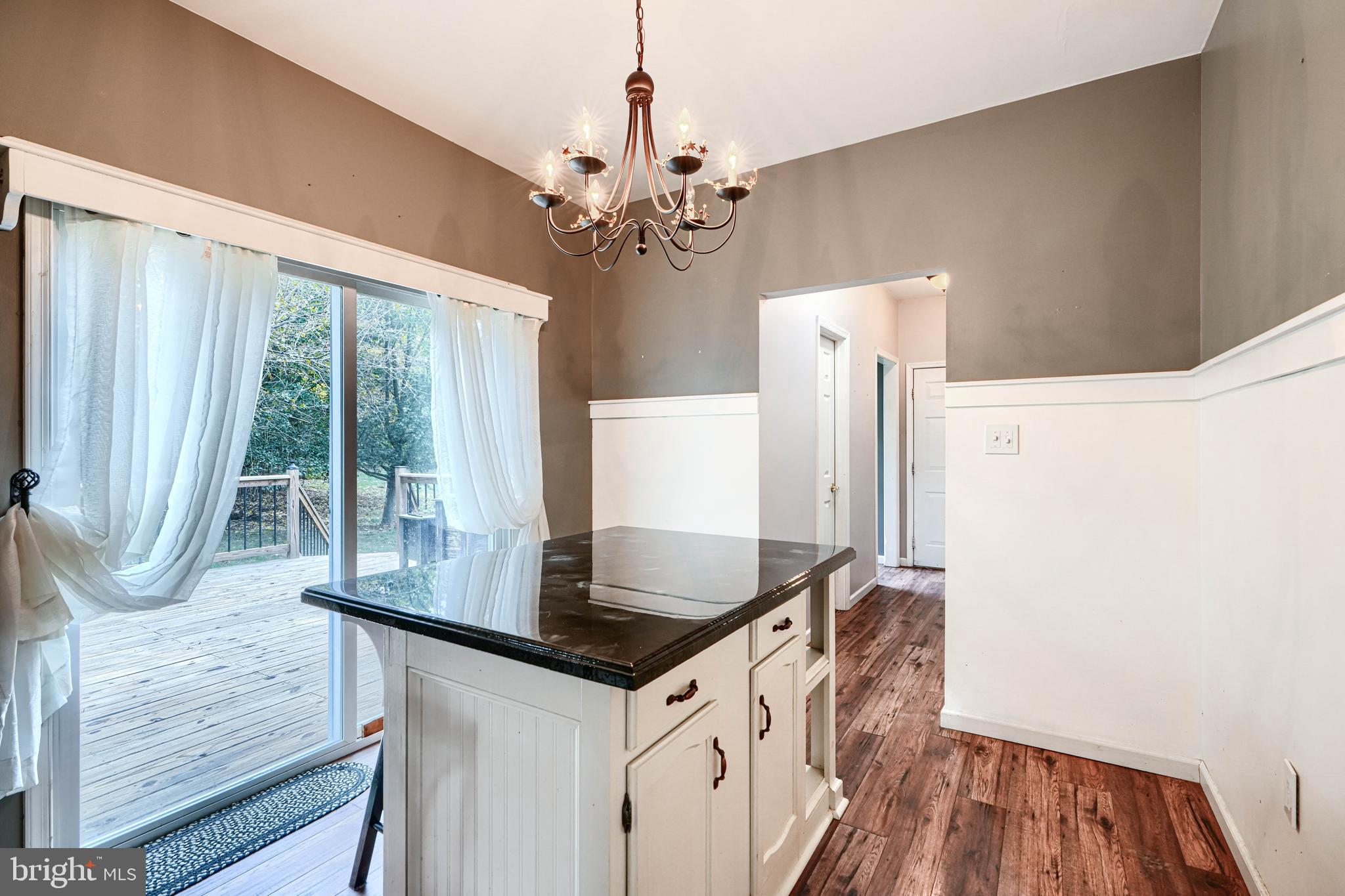 544 Elk Mills Road Elkton, MD 21921 - Photo 22 of 65 a kitchen with stainless steel appliances granite countertop a sink a stove and a refrigerator