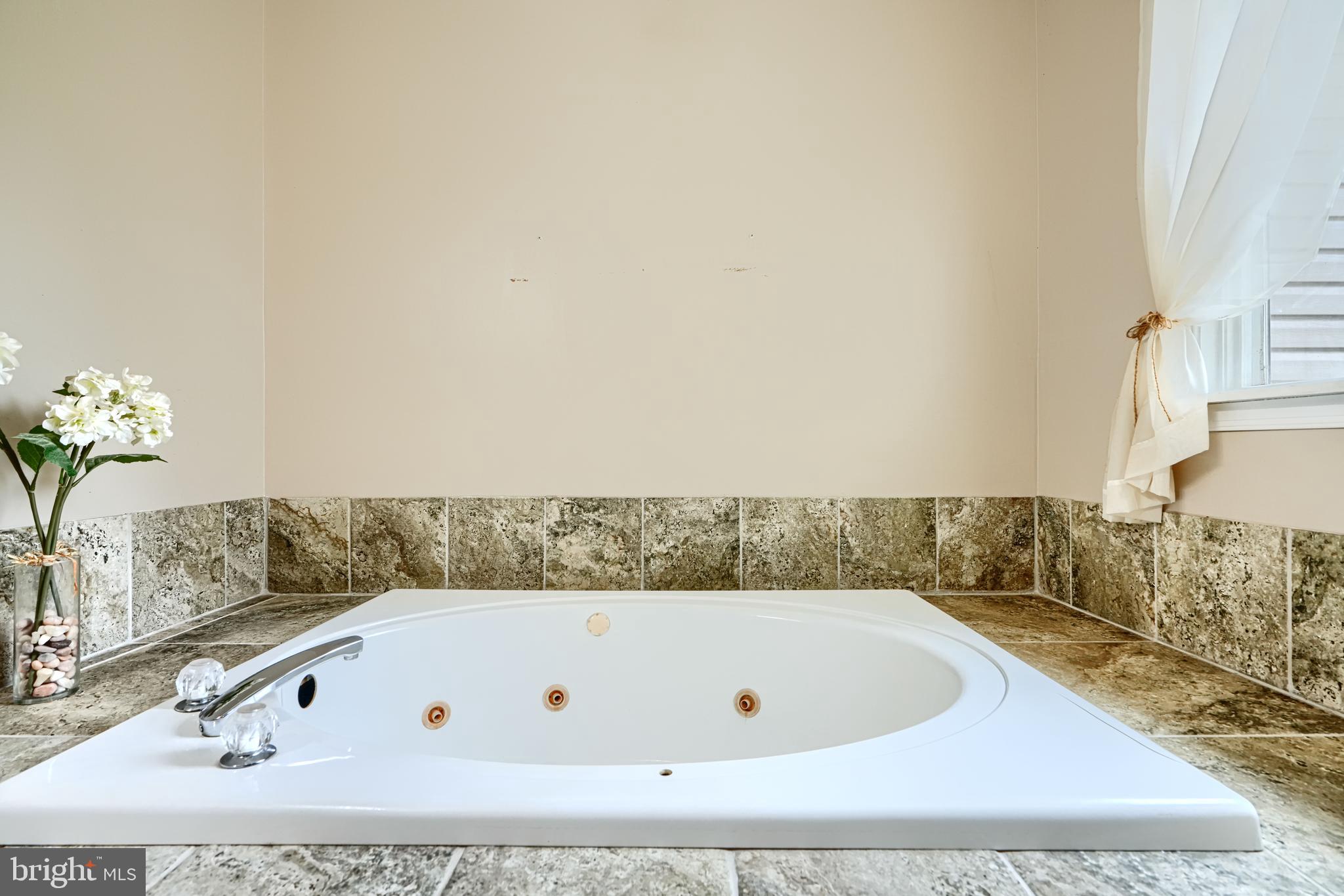 544 Elk Mills Road Elkton, MD 21921 - Photo 35 of 65 a bathroom with a bathtub and shower