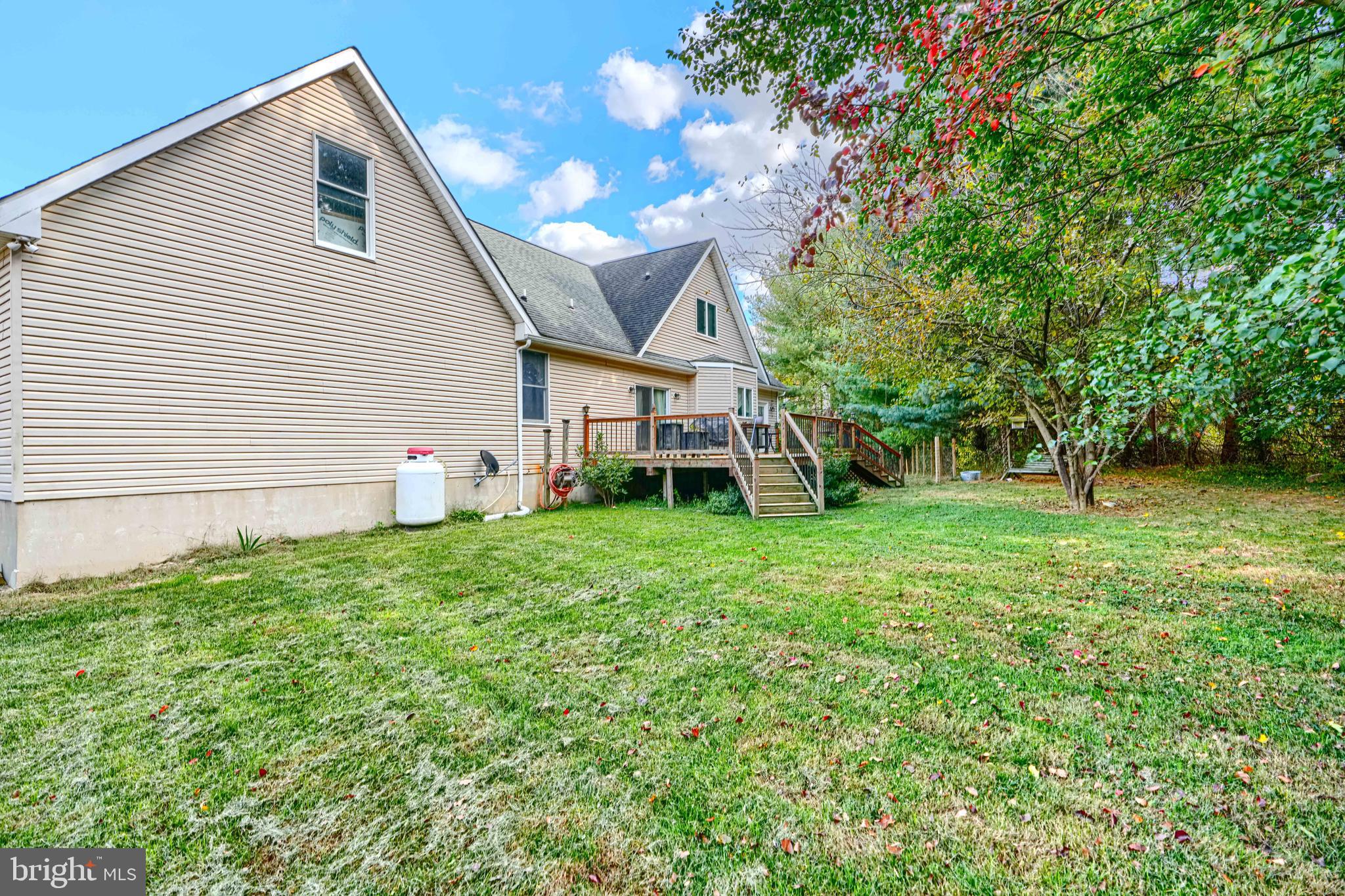 544 Elk Mills Road Elkton, MD 21921 - Photo 49 of 65 a view of a house with backyard and a tree