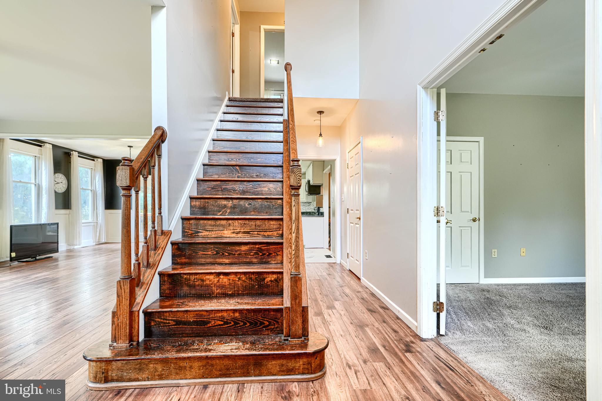 544 Elk Mills Road Elkton, MD 21921 - Photo 5 of 65 a view of entryway and hall with wooden floor