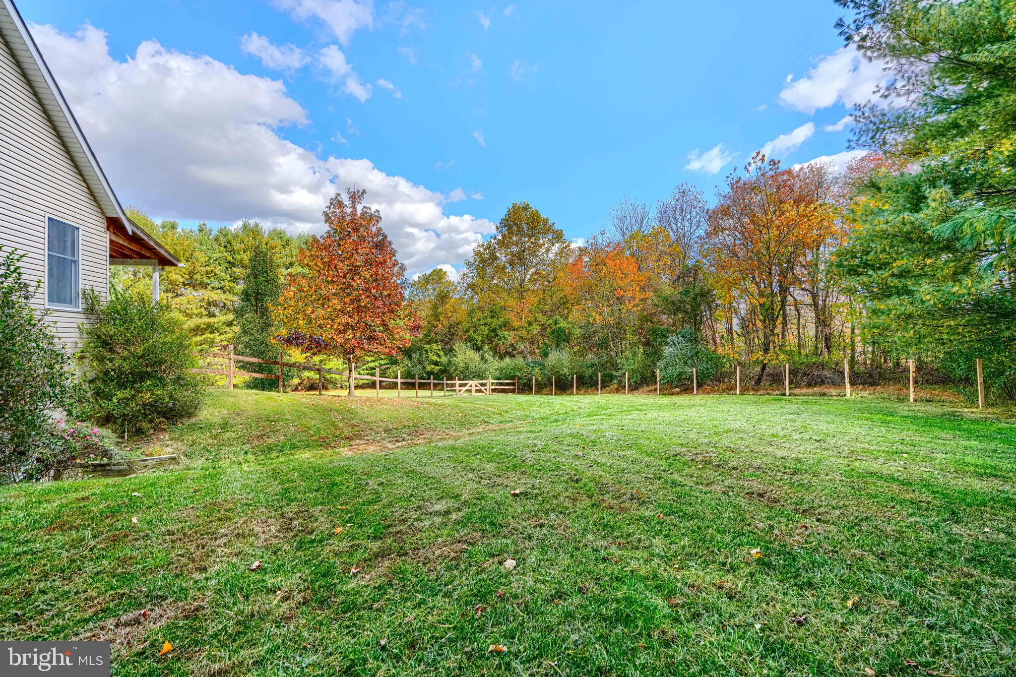 544 Elk Mills Road Elkton, MD 21921 - Photo 56 of 65 a view of a big yard with a house in the background