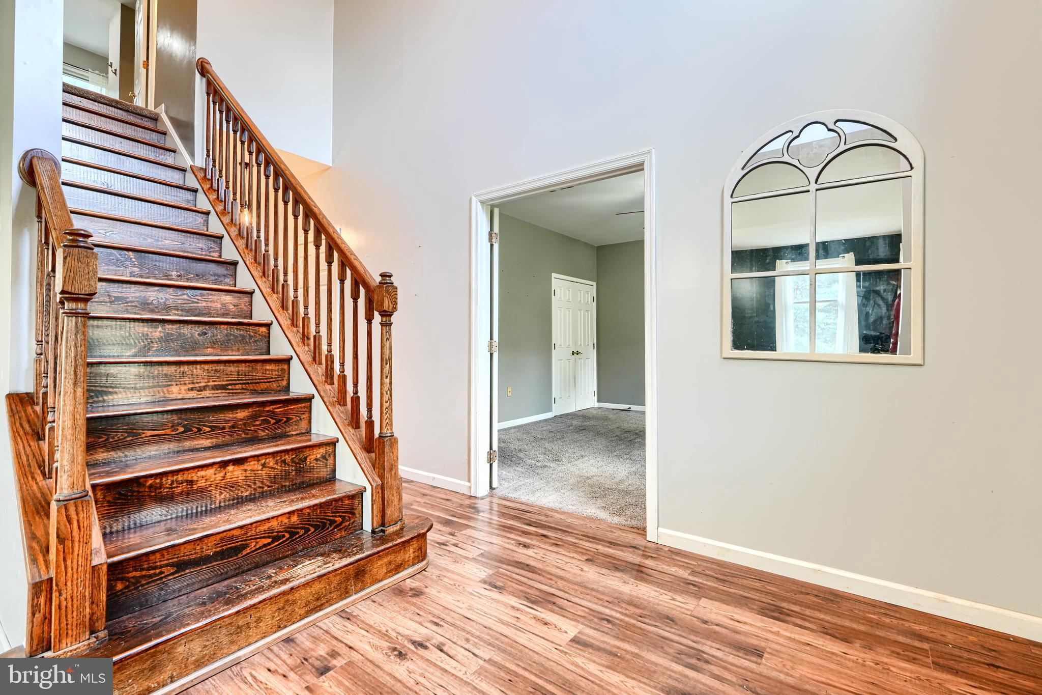 544 Elk Mills Road Elkton, MD 21921 - Photo 7 of 65 a view of a livingroom with wooden floor and entryway
