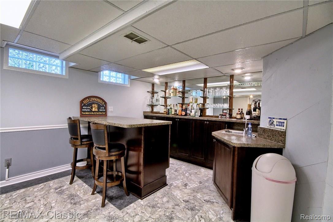 50888 Warren Road Canton, MI 48187 - Photo 29 of 37 Finished_Lower_Level_Bar.jpg
