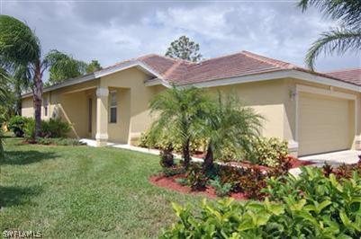 a view of a house with a street