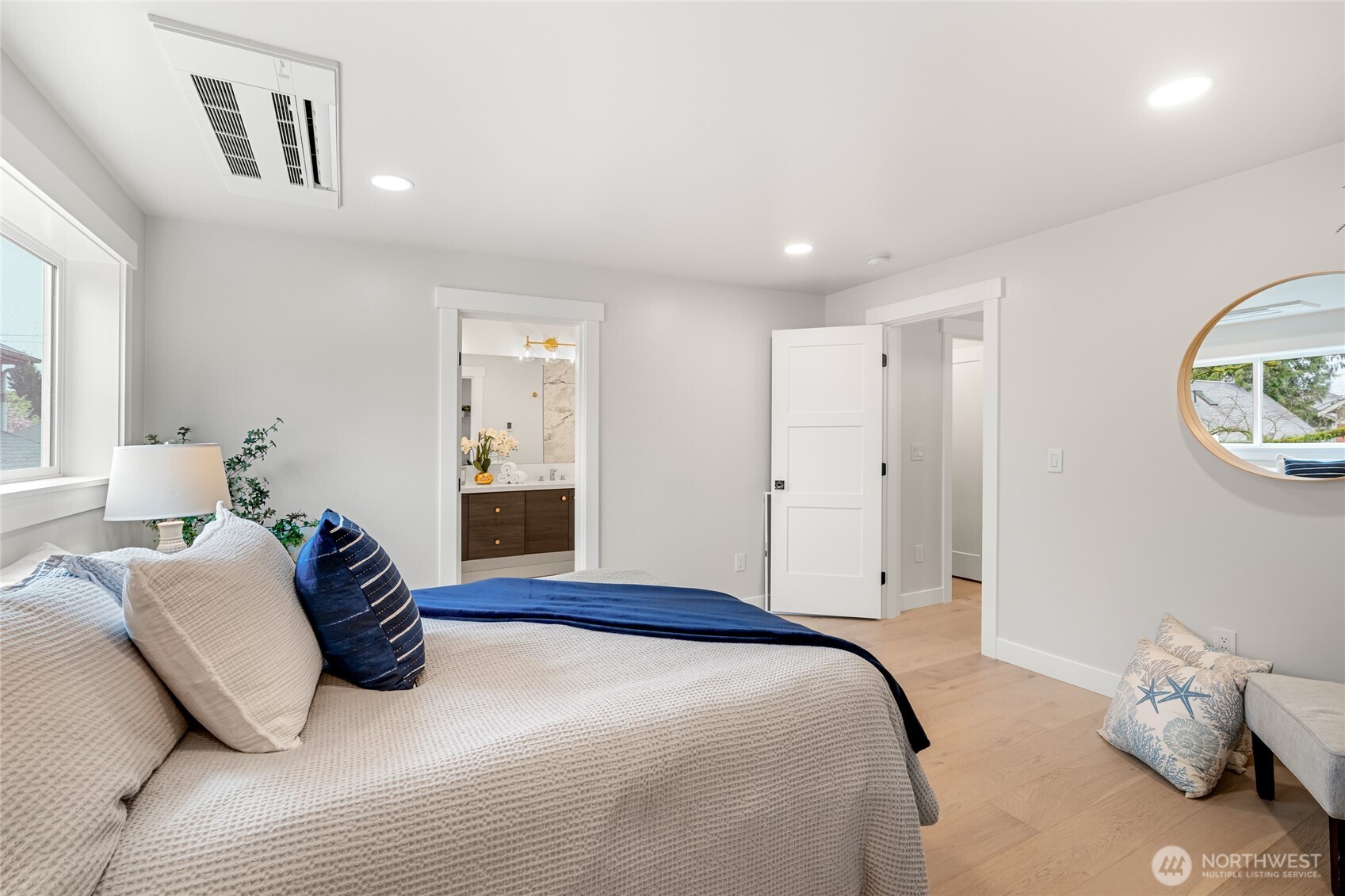 1616 21st Avenue Seattle, WA 98122 - Photo 13 of 26 a bedroom with a bed and window