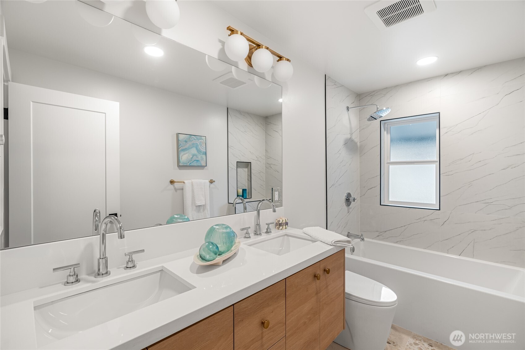 1616 21st Avenue Seattle, WA 98122 - Photo 19 of 26 a bathroom with a granite countertop sink mirror vanity and toilet