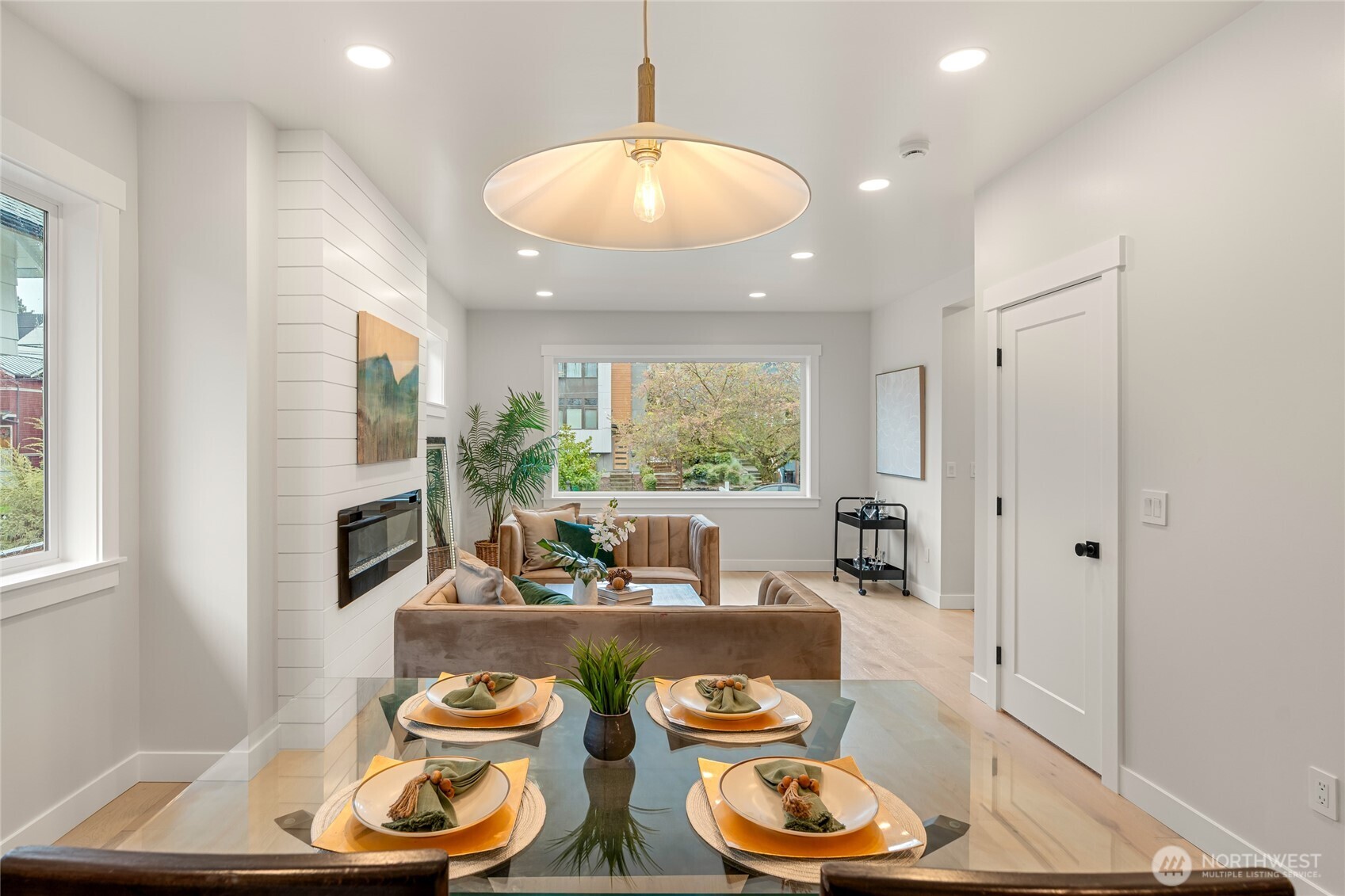 1616 21st Avenue Seattle, WA 98122 - Photo 6 of 26 a living room with dining table and chairs