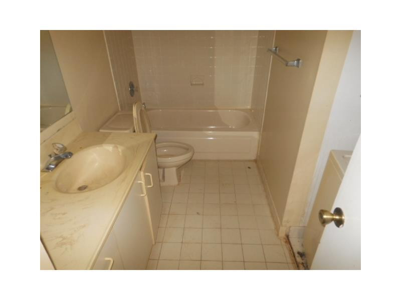 9001 Wiles Road, Unit 101 Coral Springs, FL 33067 - Photo 8 of 10 Bathroom Master