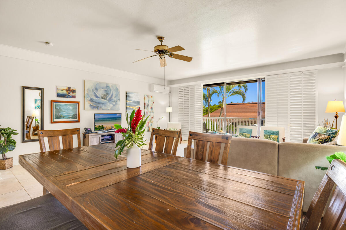 2253 Poipu Road, Unit 241 Koloa, HI 96756 - Photo 11 of 30 a living room with furniture dining room and wooden floor