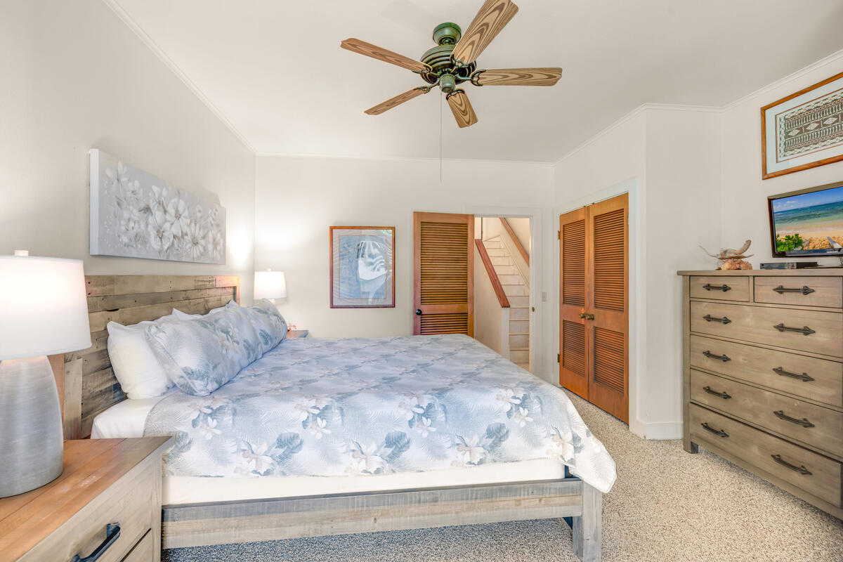 2253 Poipu Road, Unit 241 Koloa, HI 96756 - Photo 15 of 30 a bedroom with a bed and a dresser