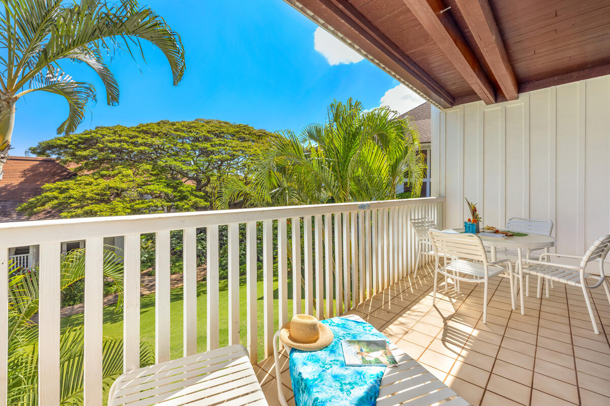 2253 Poipu Road, Unit 241 Koloa, HI 96756 - Photo 21 of 30 a balcony view with a chair and table