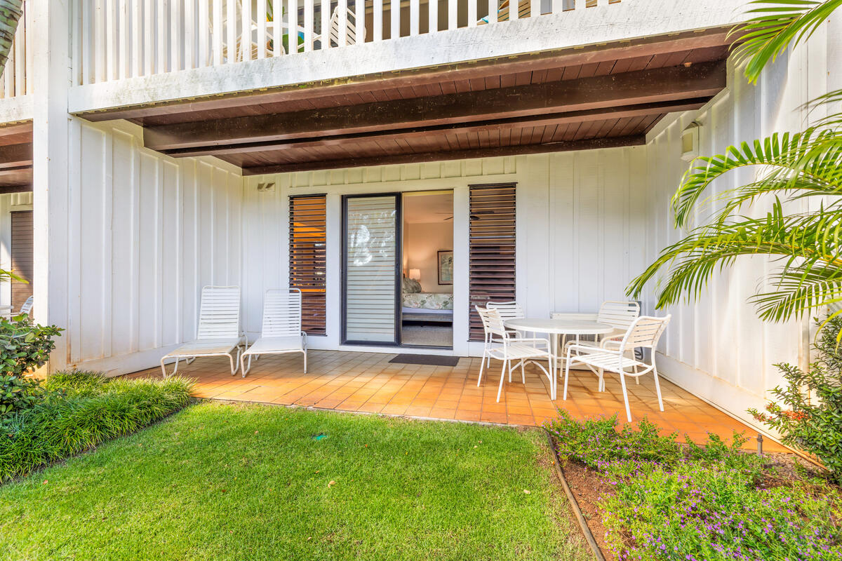 2253 Poipu Road, Unit 241 Koloa, HI 96756 - Photo 23 of 30 a front view of a house with a garden and patio