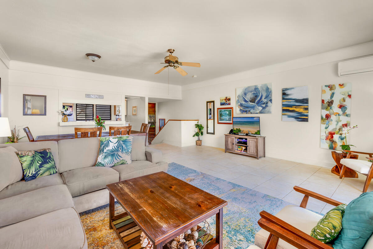 2253 Poipu Road, Unit 241 Koloa, HI 96756 - Photo 7 of 30 a living room with furniture and kitchen view