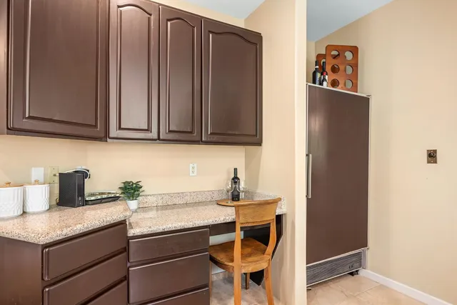 a kitchen with a sink and a window