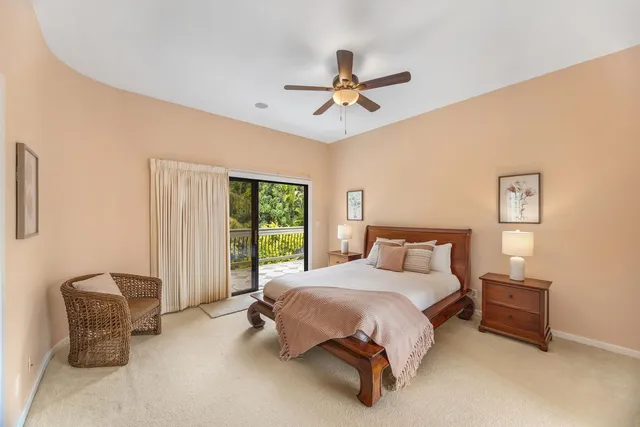 a spacious bathroom with a double vanity sink and a mirror