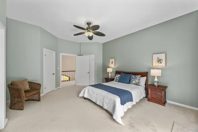 a bathroom with a tub sink and shower