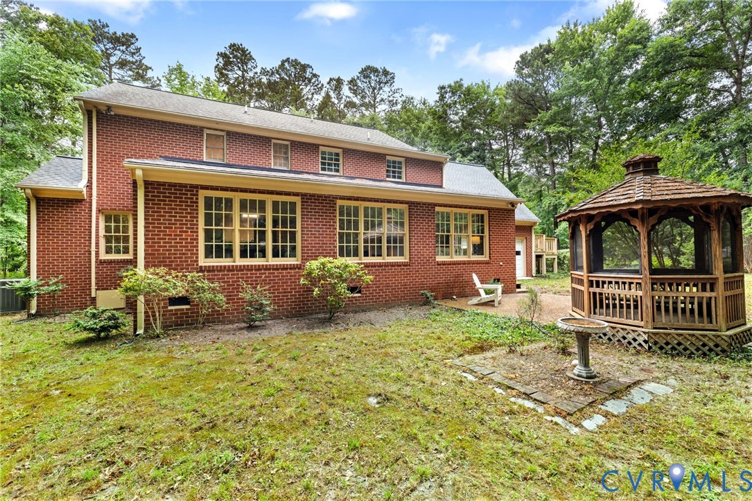 2615 Salisbury Road Midlothian, VA 23113 - Photo 30 of 36 front view of a house with a yard