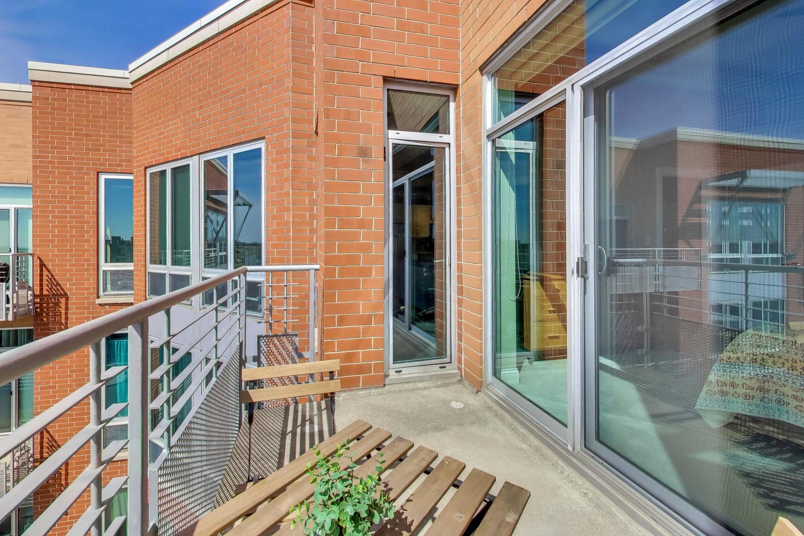 4846 North Clark Street, Unit 510 Chicago, IL 60640 - Photo 26 of 32 a view of a house with a porch