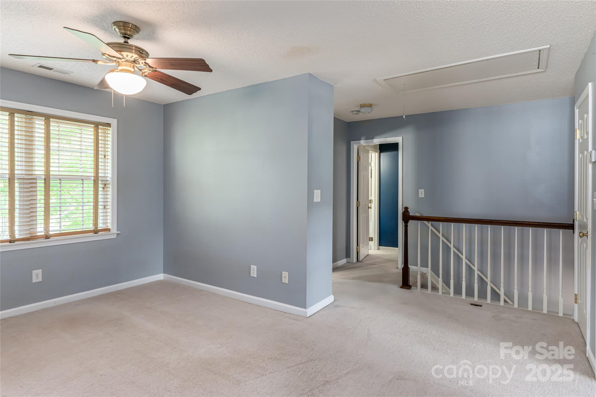153 Rolling Meadow Road Fletcher, NC 28732 - Photo 15 of 34 a view of a livingroom with a ceiling fan and window