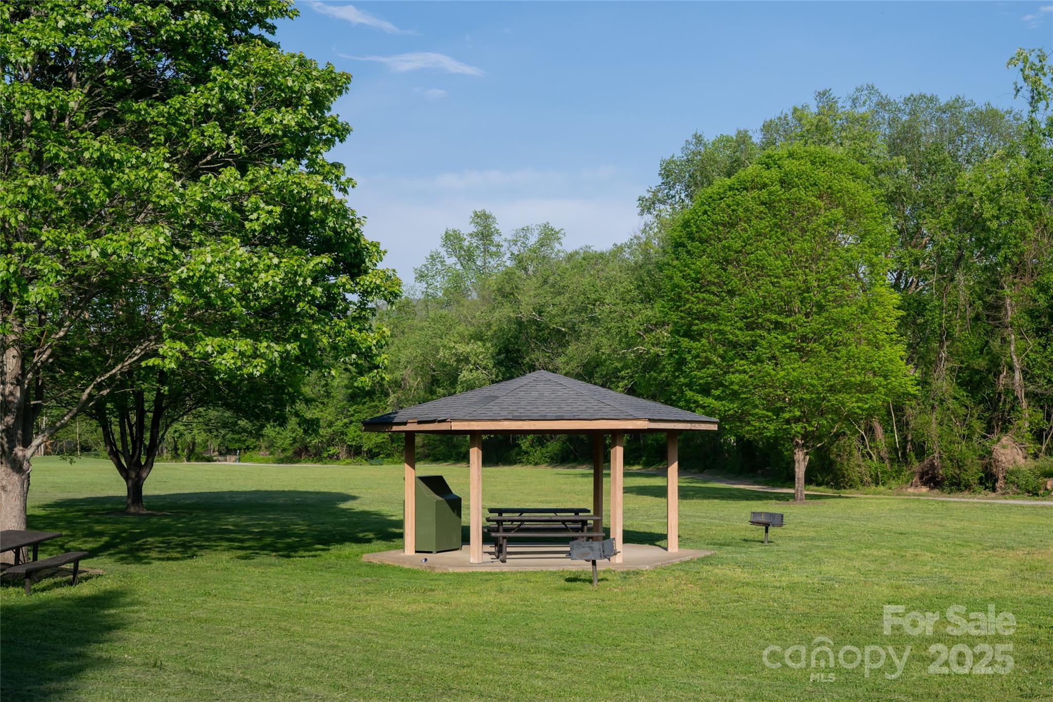 153 Rolling Meadow Road Fletcher, NC 28732 - Photo 32 of 34 a view of a house with a yard