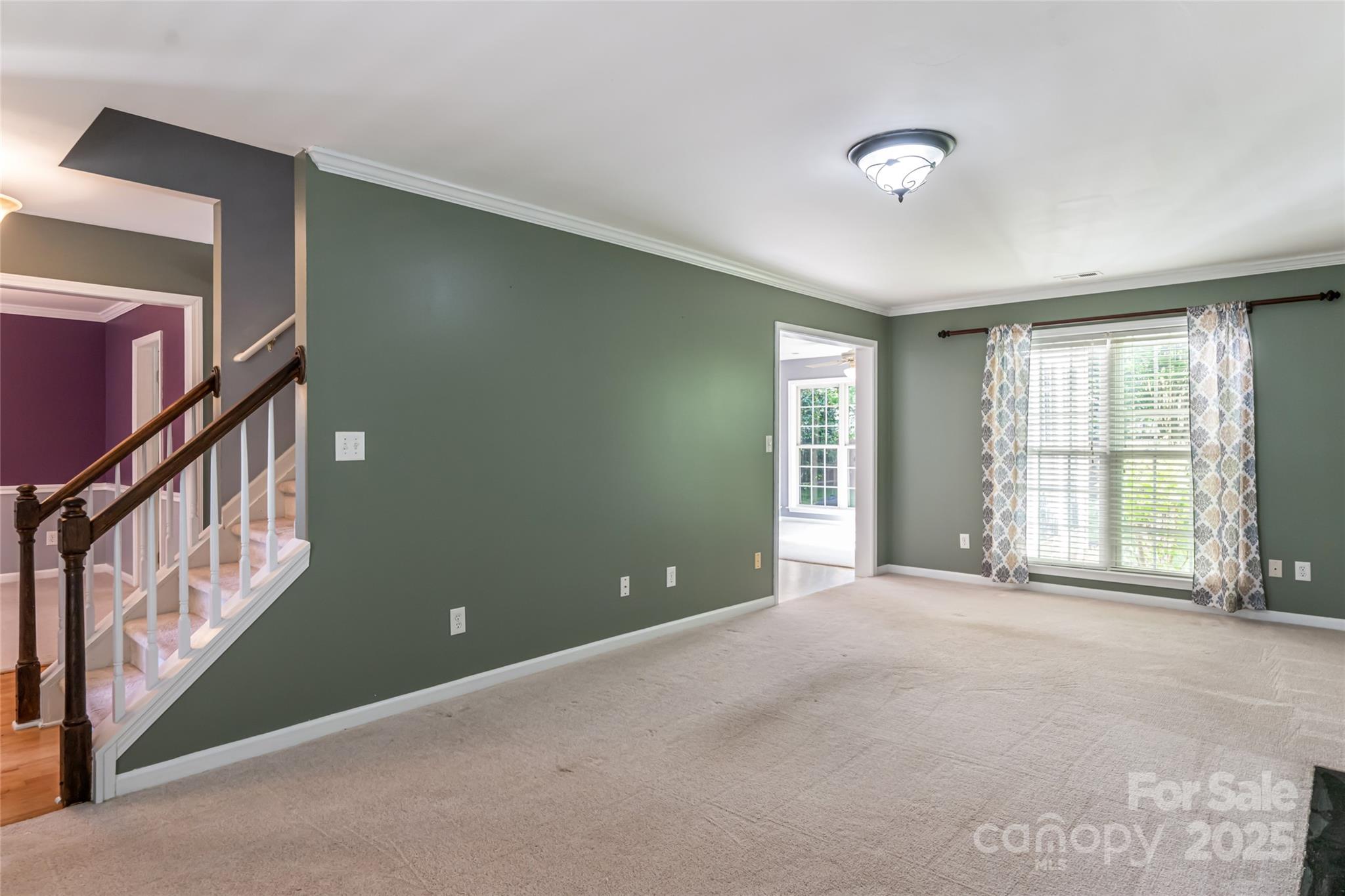 153 Rolling Meadow Road Fletcher, NC 28732 - Photo 5 of 34 a view of an empty room with a window