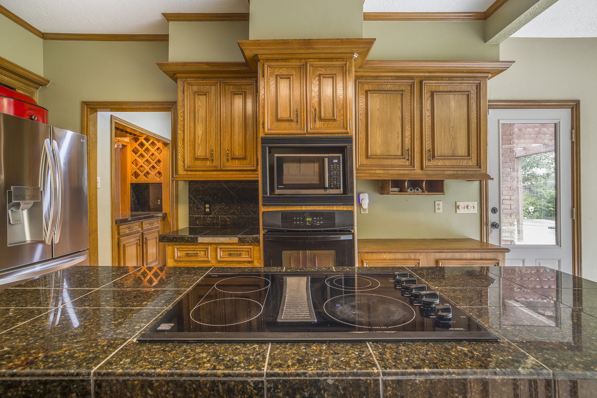 6039 Spanish Oak Way Spring, TX 77379 - Photo 14 of 38 a room with wooden floor and windows