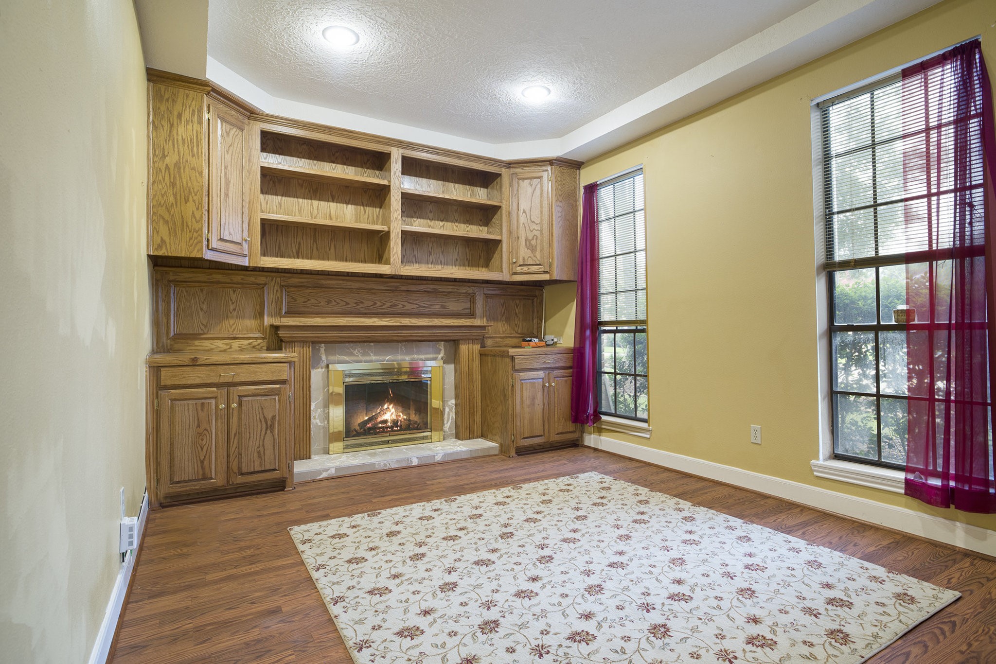 6039 Spanish Oak Way Spring, TX 77379 - Photo 19 of 38 a view of a livingroom with a fireplace
