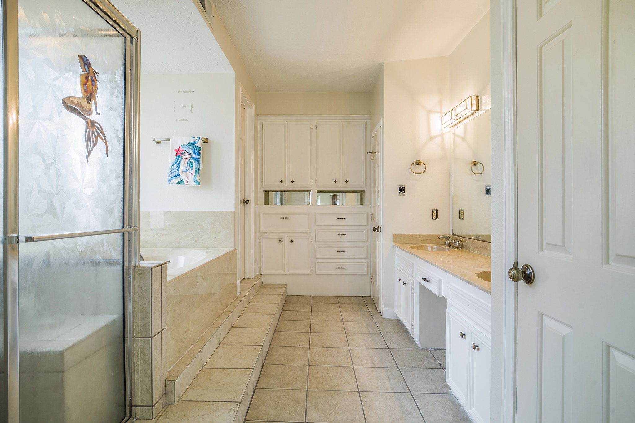 6039 Spanish Oak Way Spring, TX 77379 - Photo 23 of 38 a bathroom with a granite countertop bathtub a sink and a shower