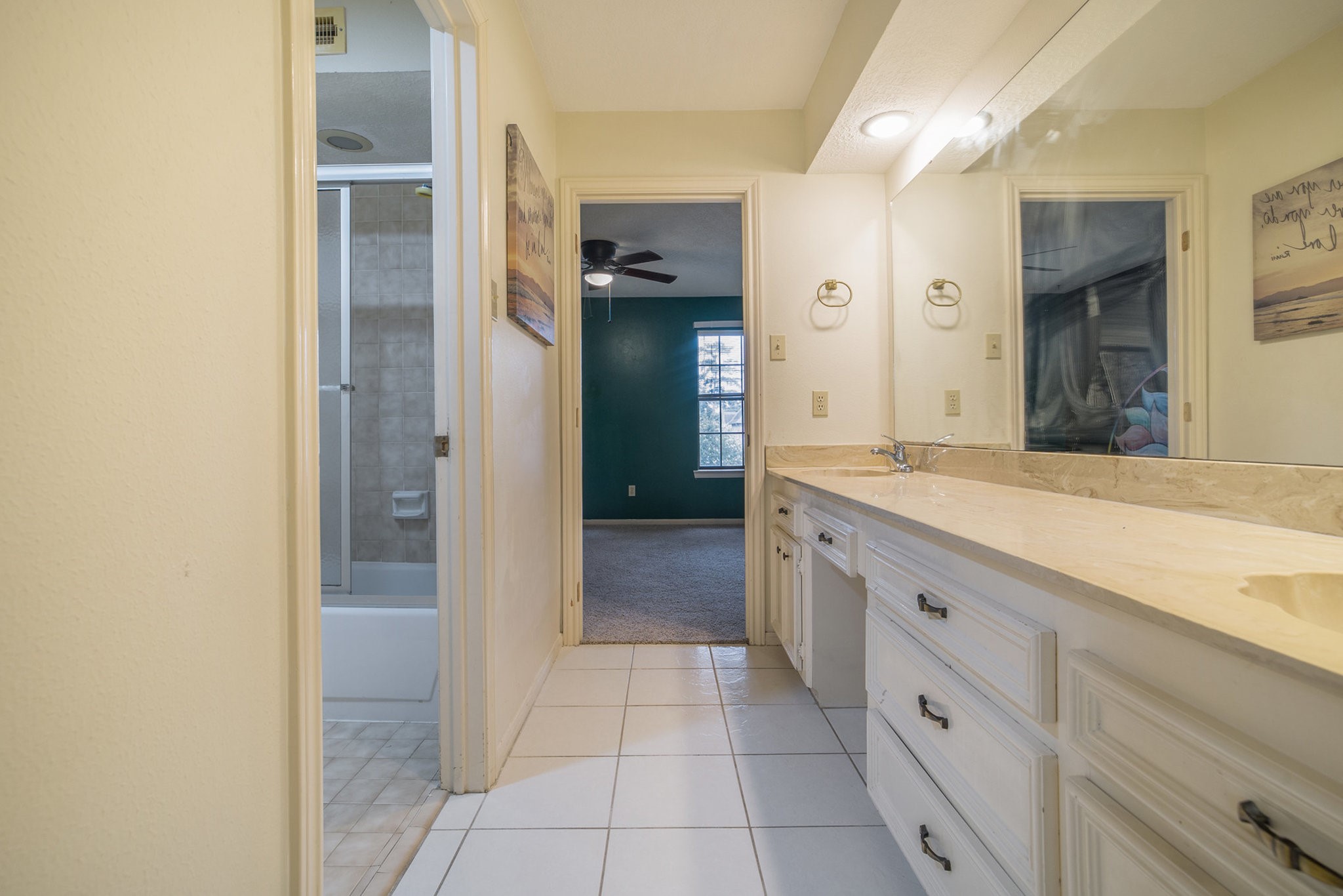 6039 Spanish Oak Way Spring, TX 77379 - Photo 32 of 38 a bathroom with a granite countertop sink mirror and