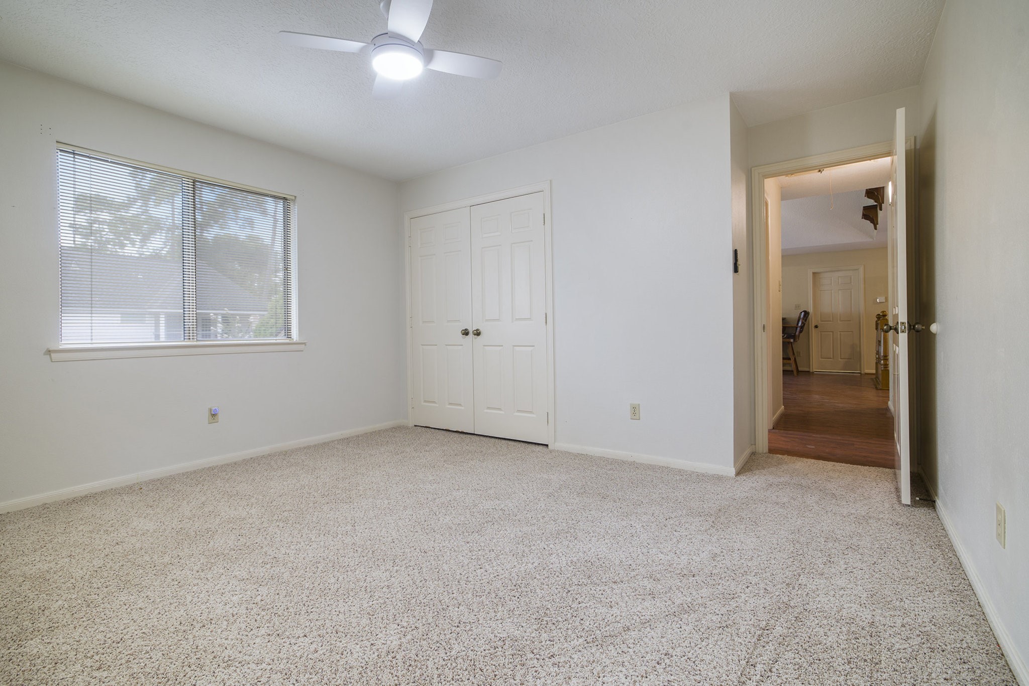 6039 Spanish Oak Way Spring, TX 77379 - Photo 34 of 38 an empty room with windows and closet