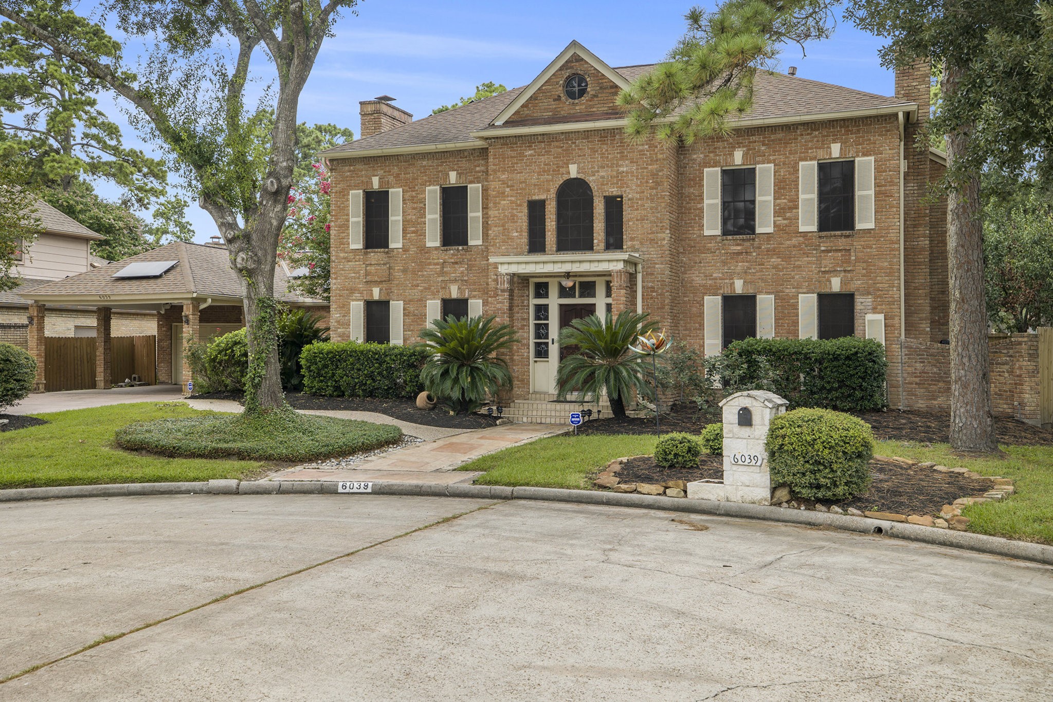 6039 Spanish Oak Way Spring, TX 77379 - Photo 4 of 38 front view of a house with a yard