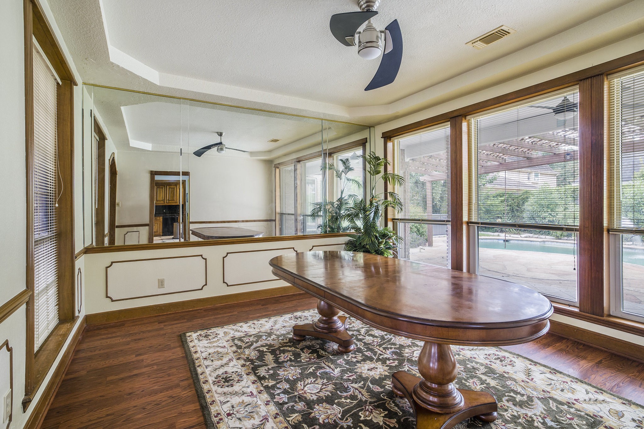 6039 Spanish Oak Way Spring, TX 77379 - Photo 10 of 38 a living room with dining table and a rug