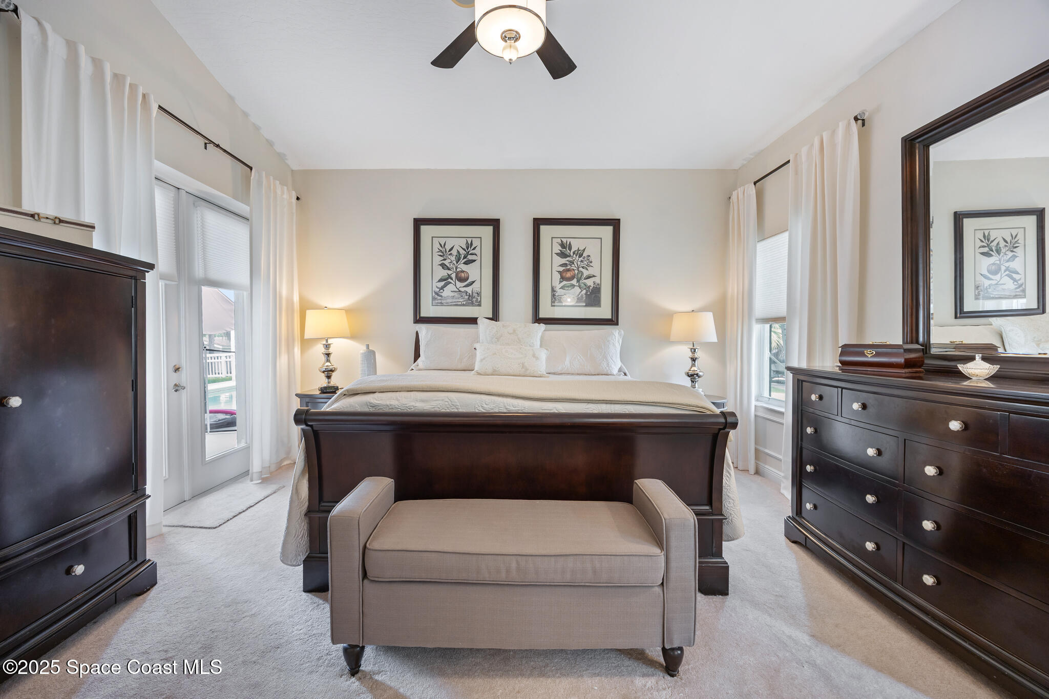 7210 Wando Avenue Grant, FL 32949 - Photo 23 of 41 a living room with a couch and a flat screen tv