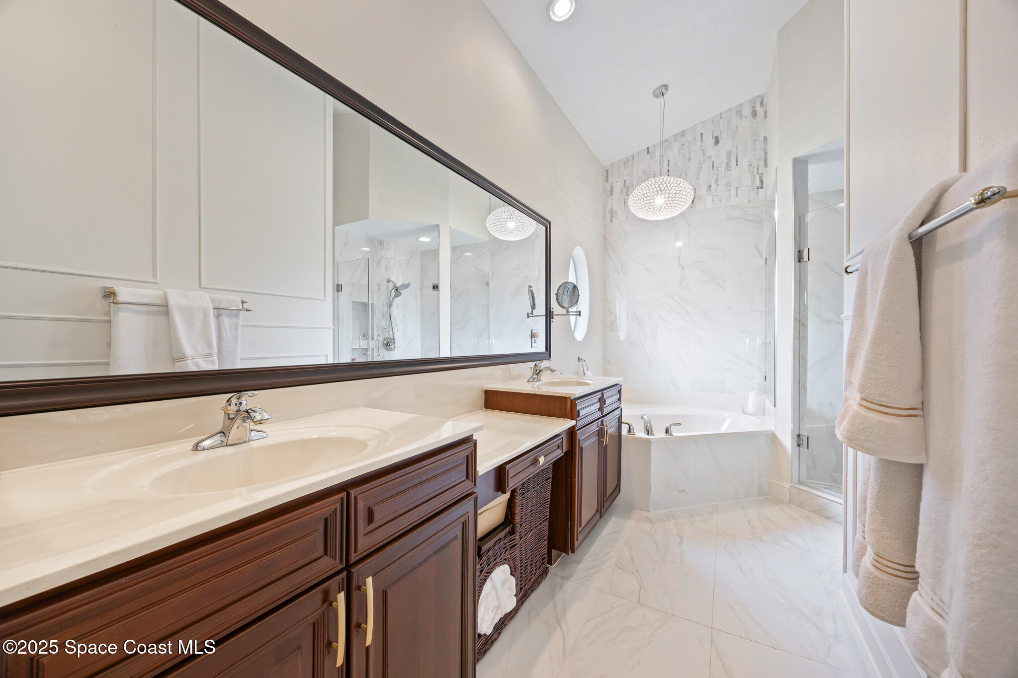 7210 Wando Avenue Grant, FL 32949 - Photo 24 of 41 a bathroom with a tub sink and mirror
