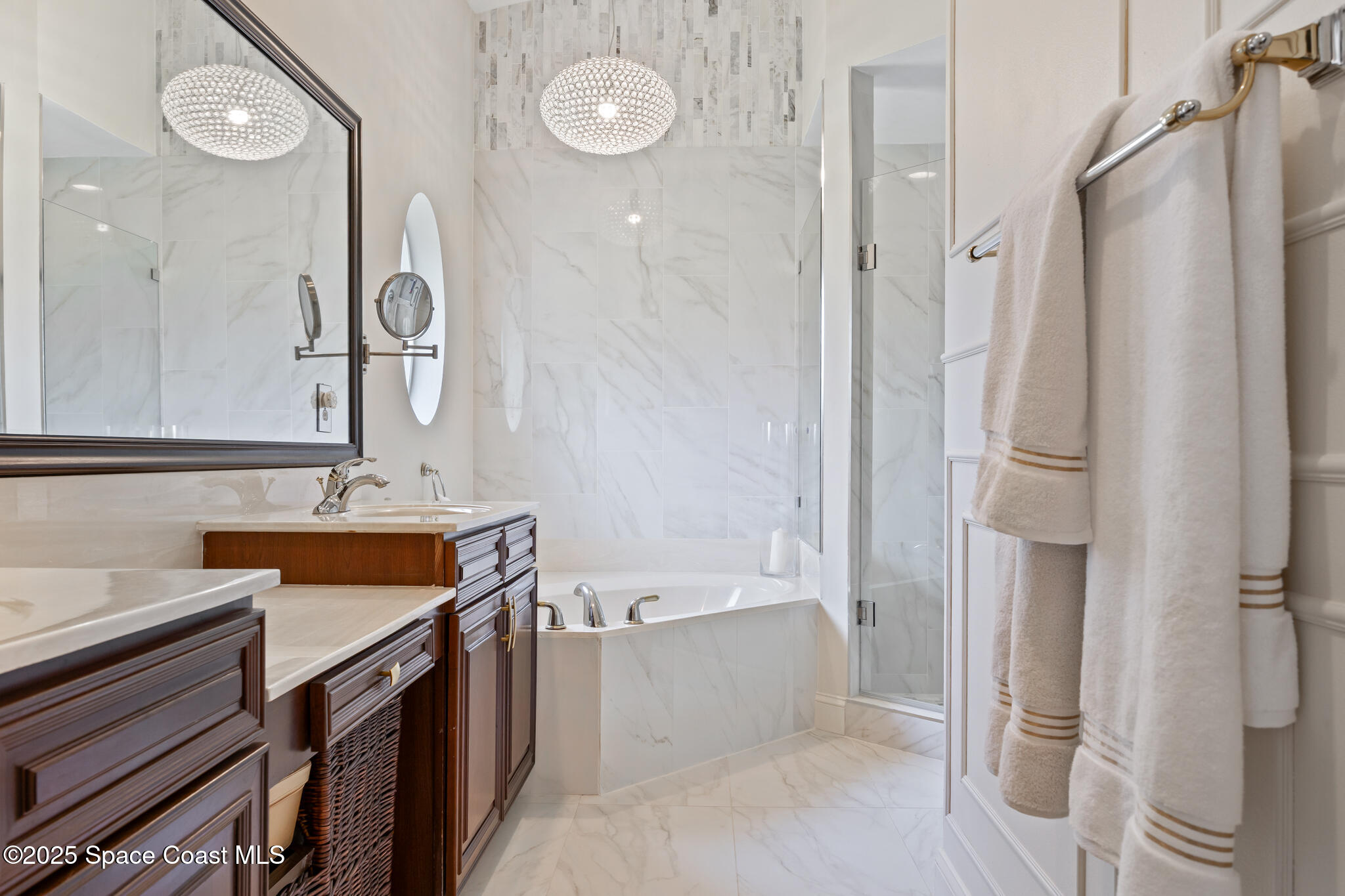 7210 Wando Avenue Grant, FL 32949 - Photo 26 of 41 a bathroom with a tub sink and mirror