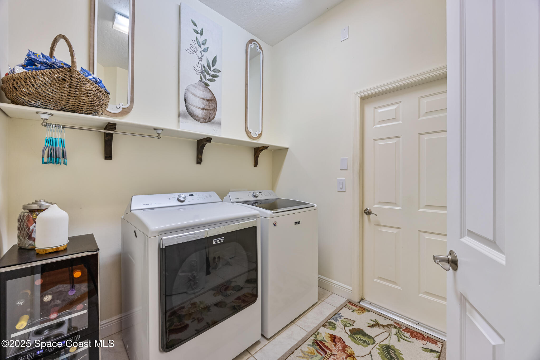 7210 Wando Avenue Grant, FL 32949 - Photo 29 of 41 a utility room with dryer and washer
