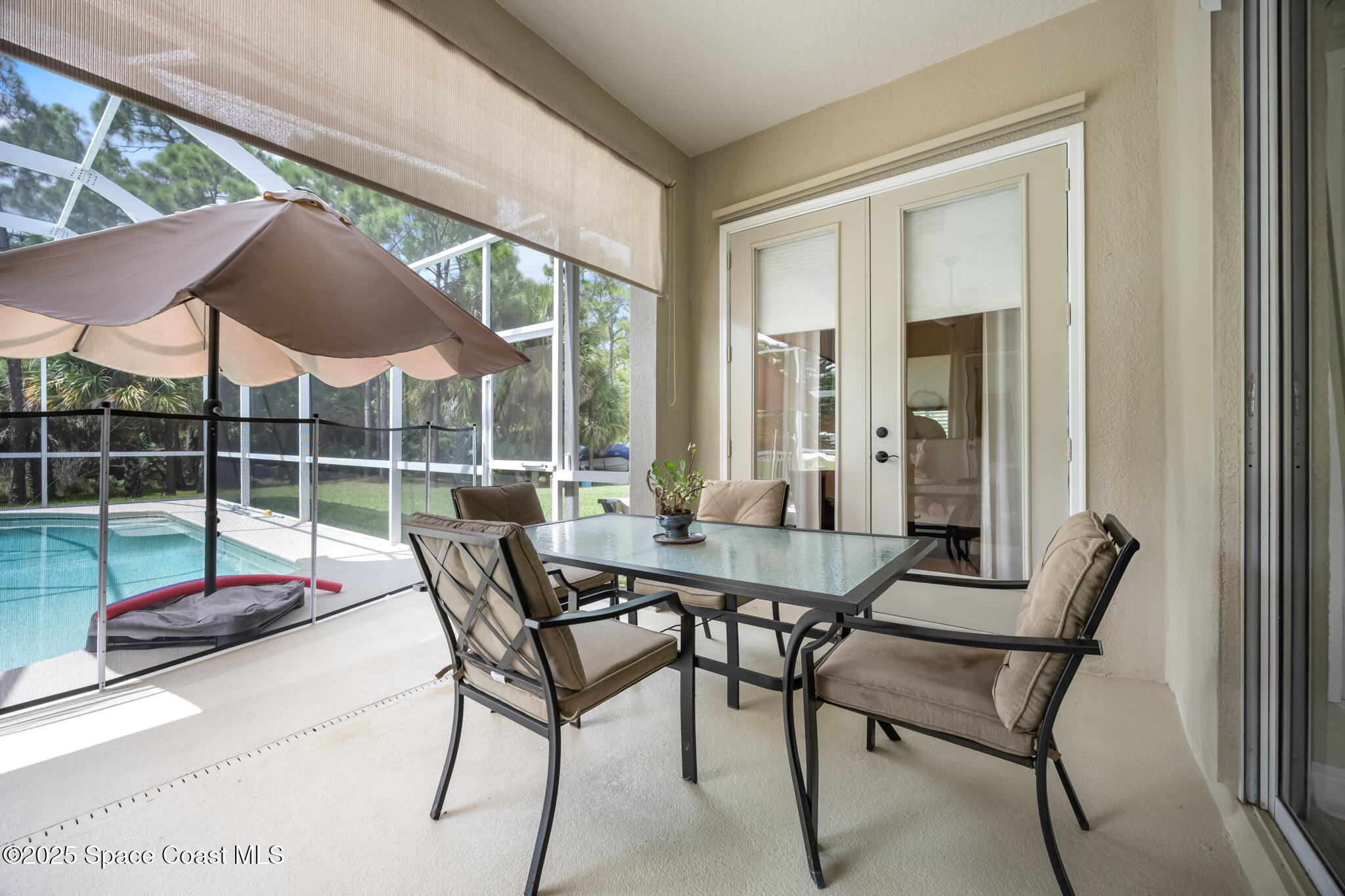 7210 Wando Avenue Grant, FL 32949 - Photo 30 of 41 a view of a dining room with furniture and window