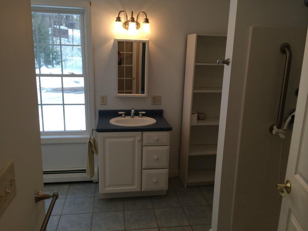 128 Cove Road Auburn, ME 04210 - Photo 11 of 31 The spacious 1st floor bathroom...